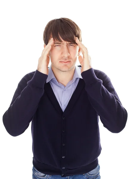 Young business man holding head in pain — Stock Photo, Image