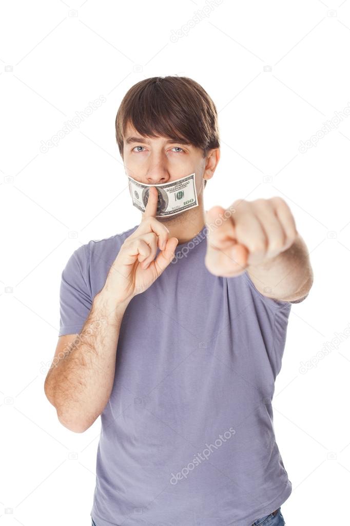 Young man with his mouth sealed by a hundred dollar bills isolat