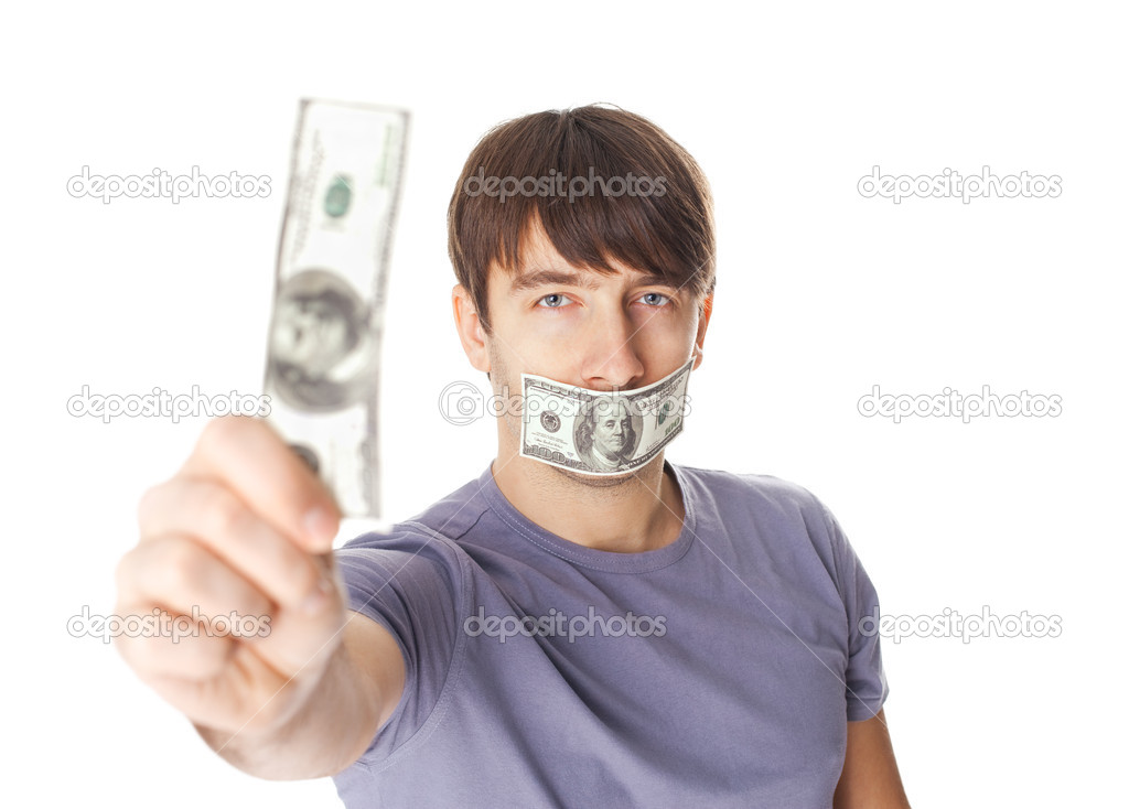 Young man with his mouth sealed by hundred dollar bills for brib