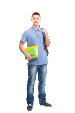 Kitapları ve sırt çantası olan öğrenci beyaza izole edilmiş.