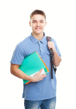 defter ve sırt çantası ile mutlu gülümseyen öğrenci