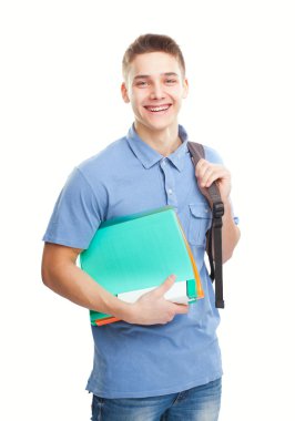 defter ve sırt çantası ile mutlu gülen öğrenci