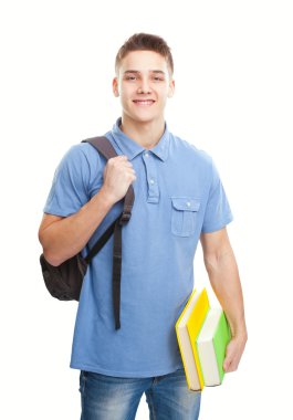 Öğrenci kitap ve üzerinde beyaz izole sırt çantası ile gülümseyen