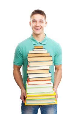 büyük kitap yığını tutan öğrenci gülümseyen