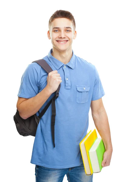 Sırt çantalı ve kitaplı gülümseyen öğrenci — Stok fotoğraf