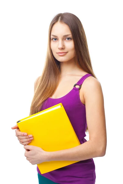 Young student girl holding yellow book — Stock Photo, Image