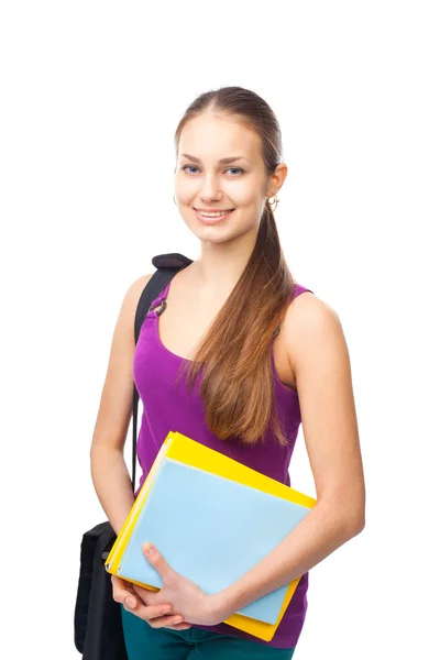 Chica estudiante sonriente bastante joven con libros y bolsa —  Fotos de Stock