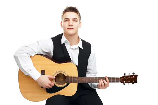 Young man playing on guitar — Stock Photo, Image