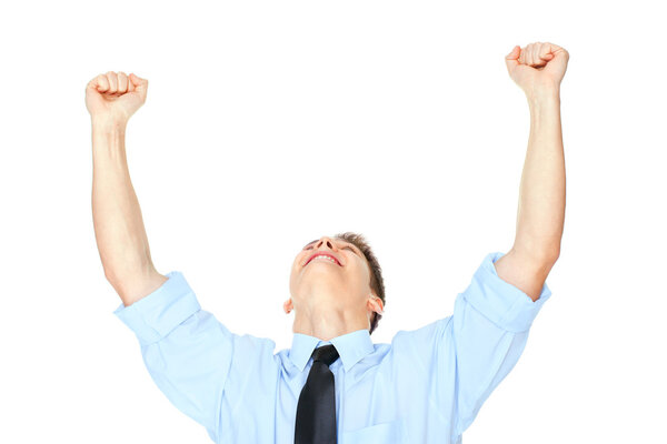 Young businessman celebrating success