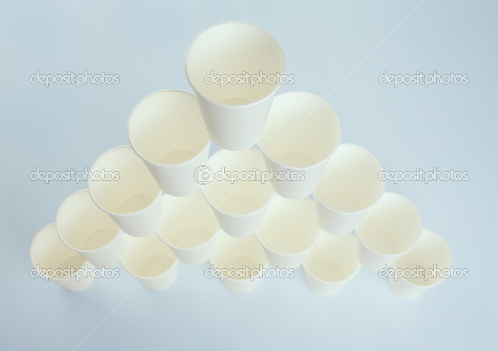 Pyramid of white paper cups Stock Photo by ©Gladkov 30753947