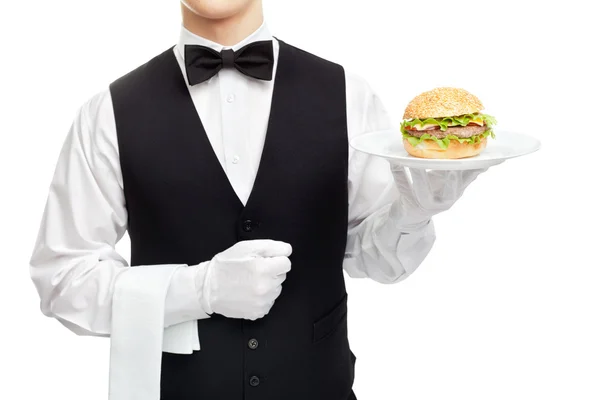 Waiter torso with hamburger on plate — Stock Photo, Image