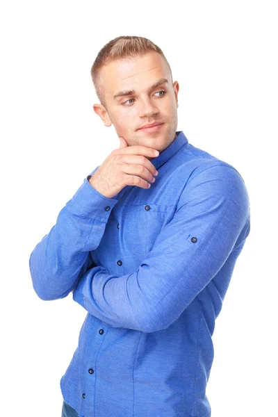 Joven vistiendo una camisa azul mira a un lado — Foto de Stock