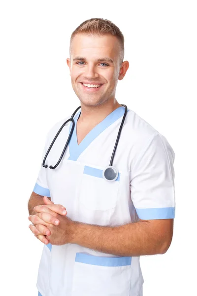 Happy smiling young doctor in uniform — Stock Photo, Image