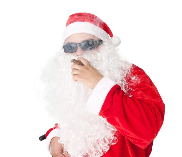 Papai Noel usando óculos de sol e fumar um charuto — Fotografia de Stock