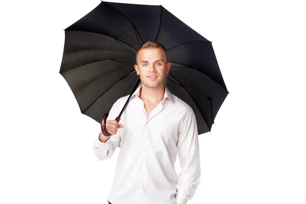 Young man under an umbrella — Stock Photo, Image