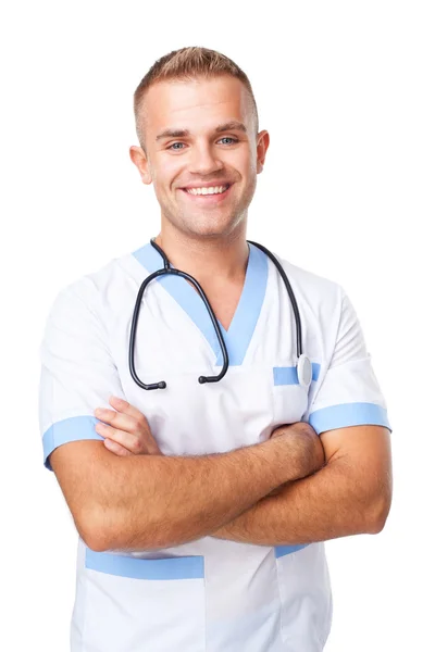 Heureux sourire jeune médecin en uniforme — Photo