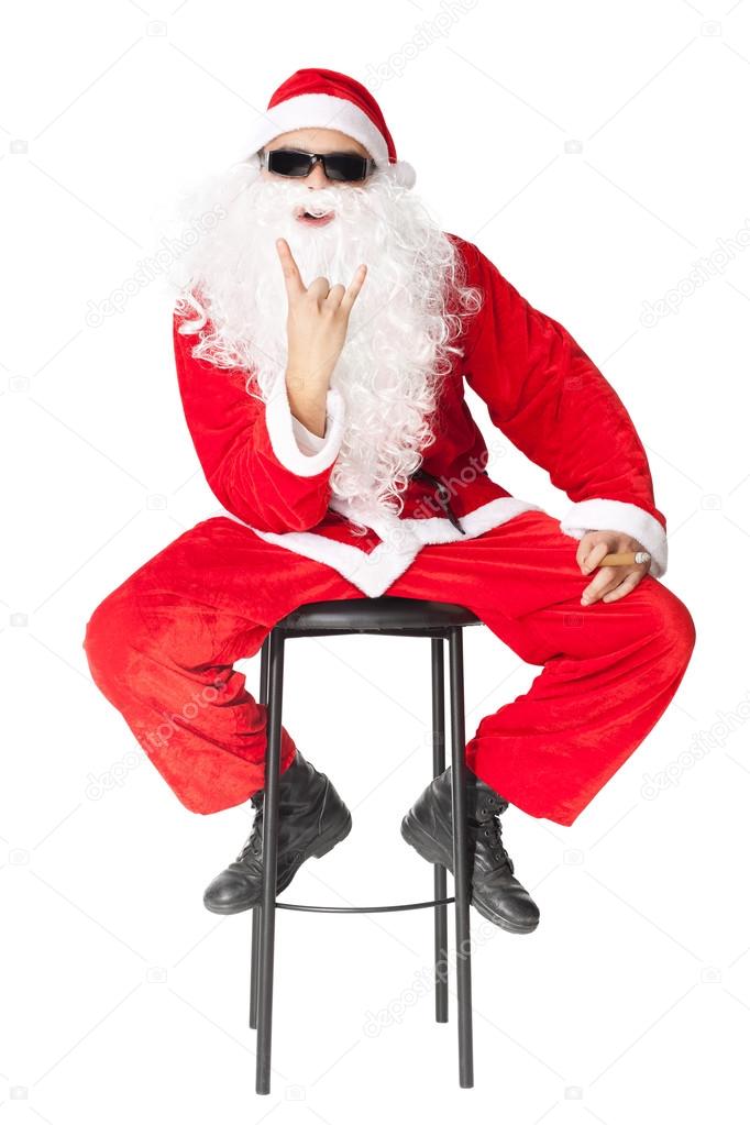 Santa Claus Showing The Rocker Hand Sign And Smoking A Cigar Stock Photo C Gladkov