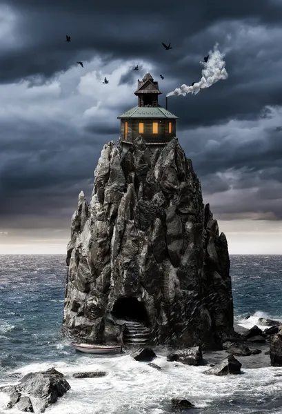 Fantasie huis op een rots eiland in zee — Stockfoto