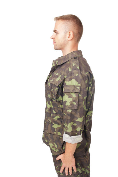 side view of army soldier standing in attention