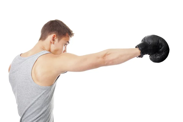 Joven boxeador haciendo ponche — Foto de Stock