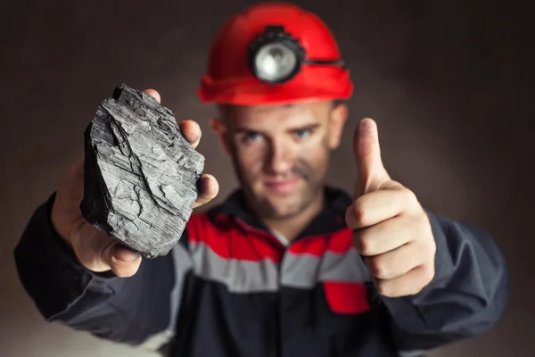 Coal miner with lump of coal — Stock Photo, Image