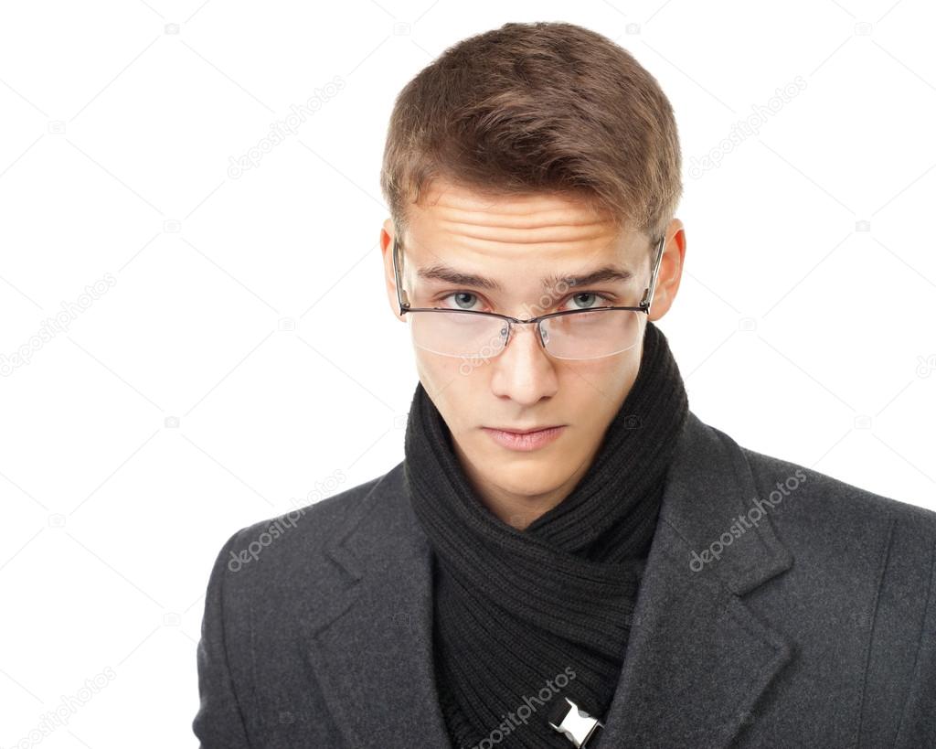 Elegant man looking over glasses