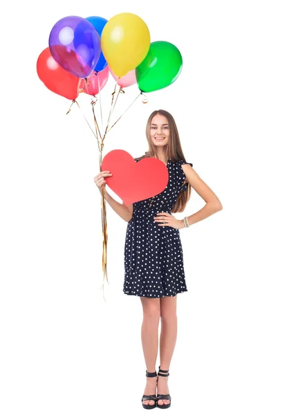 Ευτυχισμένη γυναίκα με μπαλόνια και κόκκινη καρδιά — Φωτογραφία Αρχείου