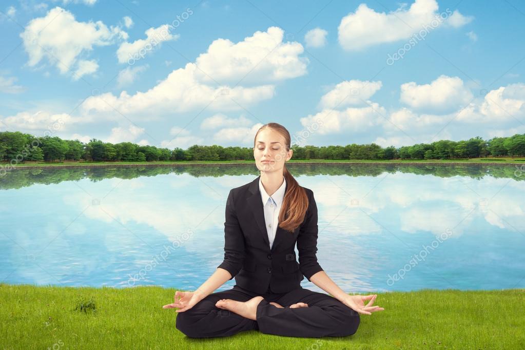 young business woman meditating