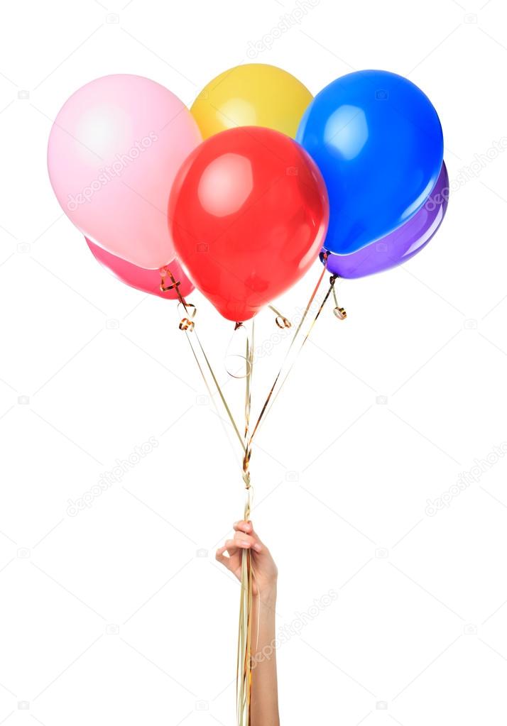 Hand holding colorful balloons
