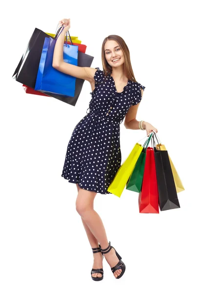 Žena s barevnými nákupní tašky — Stock fotografie
