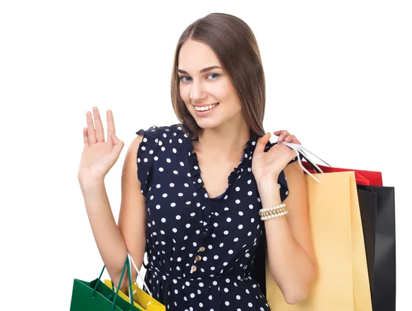 Frau mit bunten Einkaufstaschen — Stockfoto