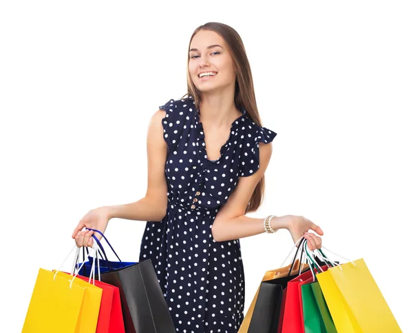 Frau mit bunten Einkaufstaschen — Stockfoto