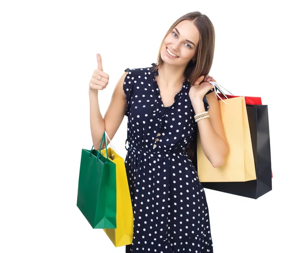 Frau mit bunten Einkaufstaschen — Stockfoto