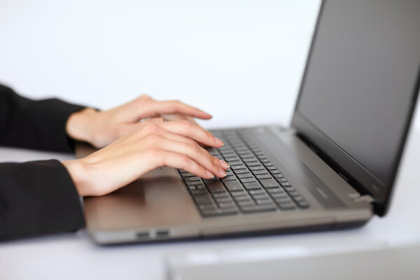 businesswoman using laptop