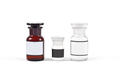 Beyaz arka planda eski ilaç şişeleri