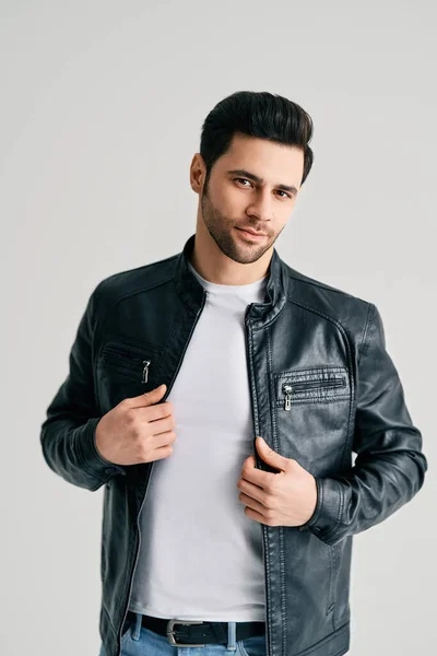 Closeup portrait of handsome trendy man posing on white studio background — Stockfoto