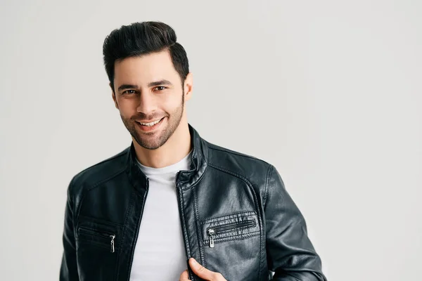 Closeup portrait of happy handsome trendy man posing on white studio background — Stockfoto