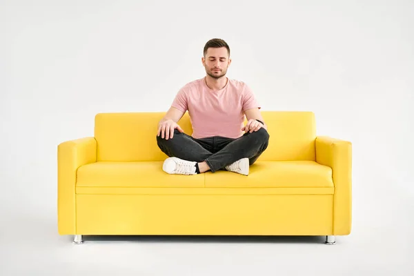 Handsome Young Man Sitting Yoga Lotus Pose Meditating Comfortable Yellow — Stock Photo, Image