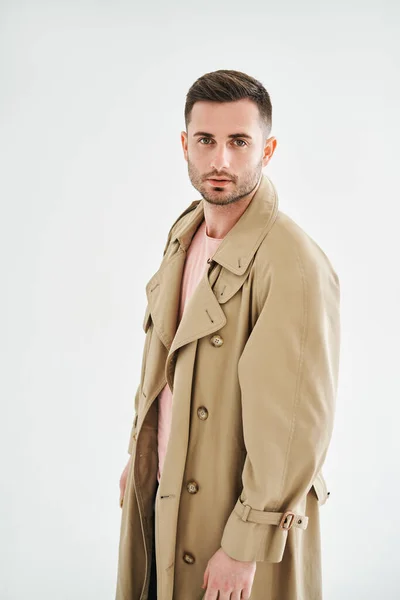 Portrait Young Trendy Man Beige Trench Coat White Studio Background — 图库照片