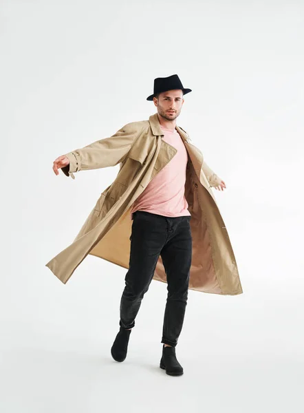 Happy Smiling Man Beige Trench Coat Spinning White Studio Background — 图库照片
