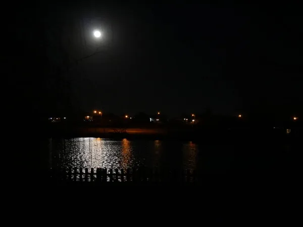 Full Moon Casting Reflections Lake Lights Houses — Stock Photo, Image