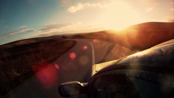 Conduciendo hacia el atardecer — Vídeos de Stock