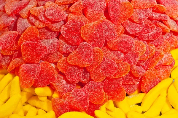Textura Caramelos Rojos Naranjas Dulces Montón Cerca Tienda Dulces Ventana —  Fotos de Stock