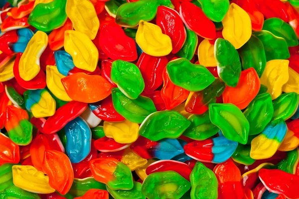 Textura Doces Amarelos Vermelhos Verdes Doces Uma Pilha Perto Janela — Fotografia de Stock