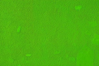 Yeşil duvarda alçı var. Beton duvar dokusu kapat.