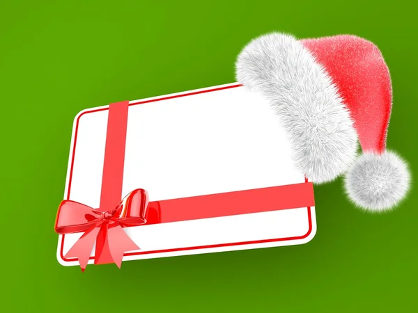 Chapéu de Papai Noel com cartão presente — Fotografia de Stock