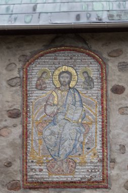 Kaliningrad, Russia - August 01 2019: the view of Jesus Christ the Almighty Mosaic icon on the wall of St. Nicholas Church on August 01 2019 in Kaliningrad, Russia.