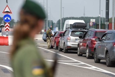 Krakivets, Ukraine - August 16, 2022: Border Guard on Krakivets-Korczowa checkpoint on the border with Ukraine and Poland, some 70 km from city of Lviv, Ukraine. 