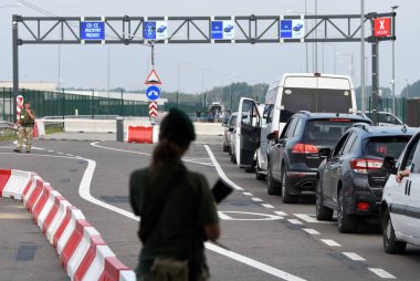 Krakivets, Ukraine - August 16, 2022: Border Guard on Krakivets-Korczowa checkpoint on the border with Ukraine and Poland, some 70 km from city of Lviv, Ukraine. 