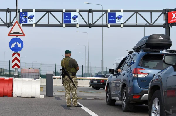 Krakivets, Ukraine - August 16, 2022: Border Guard on Krakivets-Korczowa checkpoint on the border with Ukraine and Poland, some 70 km from city of Lviv, Ukraine. 